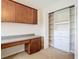 Enjoy this spacious home office with custom built-in shelving and a large closet at 1705 Plantation Pointe Dr, Orlando, FL 32824