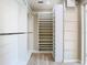 Walk-in closet featuring custom shelving units for optimal storage and organization at 1705 Plantation Pointe Dr, Orlando, FL 32824