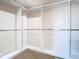 A walk-in closet with custom shelving for clothing and accessories at 1705 Plantation Pointe Dr, Orlando, FL 32824