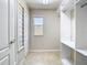 This walk-in closet features shelving and a single window that provides natural light at 1705 Plantation Pointe Dr, Orlando, FL 32824