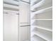 Organized walk-in closet with built-in shelving and rods for optimal storage space at 1705 Plantation Pointe Dr, Orlando, FL 32824