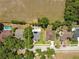 Aerial view of the property, pool, and surrounding homes at 2170 Lake Marion Dr, Apopka, FL 32712
