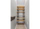 Pantry or linen closet with multiple wood shelves for organized storage at 2170 Lake Marion Dr, Apopka, FL 32712
