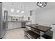 Bright kitchen features wood-look tile flooring and vaulted ceilings with skylights at 2170 Lake Marion Dr, Apopka, FL 32712
