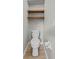 Half bathroom features floating shelves at 2170 Lake Marion Dr, Apopka, FL 32712