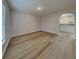 Open-concept dining area features hardwood flooring, connecting to kitchen at 105 Evergreen Dr, Auburndale, FL 33823