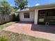 Outdoor patio with brick pavers, offering a cozy space for outdoor enjoyment at 11757 Se 71St Terrace Rd, Belleview, FL 34420