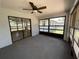 Bright sunroom with lots of windows and natural light, perfect for relaxing at 11757 Se 71St Terrace Rd, Belleview, FL 34420