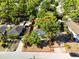 Aerial view of a property, showcasing its layout, surrounding trees, and neighborhood at 1960 Hamilton St, Bartow, FL 33830