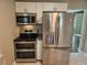 Kitchen features stainless steel appliances and bright lighting at 1960 Hamilton St, Bartow, FL 33830