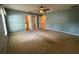 Large bedroom with multiple closets and attached laundry room for added convenience at 3210 Se 54Th Cir, Ocala, FL 34480