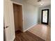 Bright entryway features decorative glass front door and leads to a closet with an open door at 3210 Se 54Th Cir, Ocala, FL 34480