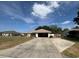 Charming single-story home with spacious driveway and well-maintained lawn at 3210 Se 54Th Cir, Ocala, FL 34480