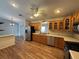 Well-lit kitchen with stainless steel appliances, ample cabinetry, and a ceiling fan at 3210 Se 54Th Cir, Ocala, FL 34480