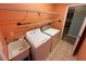 Laundry room with utility sink, shelving, washer, and dryer at 3210 Se 54Th Cir, Ocala, FL 34480