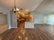 Open floor plan that connects the living space to the kitchen, allowing for easy interaction and flow at 3210 Se 54Th Cir, Ocala, FL 34480