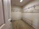 Walk-in closet with shelving and storage space at 3210 Se 54Th Cir, Ocala, FL 34480