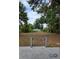 Large backyard view from patio with room for activities and entertaining amid mature trees at 1710 Hamilton St, Bartow, FL 33830