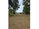 Expansive backyard offering ample space for outdoor activities and potential landscaping projects at 1710 Hamilton St, Bartow, FL 33830