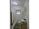 Bathroom featuring a shower, toilet, and sink, complemented by natural light from a window at 1710 Hamilton St, Bartow, FL 33830