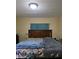 Bedroom featuring hardwood floors, bright natural light, and neutral wall color creating a comfortable retreat at 1710 Hamilton St, Bartow, FL 33830