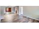 Spacious living room with hardwood floors and a view into other rooms at 3026 Pinedale Ave, Lakeland, FL 33803