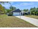 Beautiful single-Gathering home with a two-car garage, manicured lawn and lovely front yard bushes at 3690 Sw 175Th St, Ocala, FL 34473