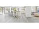Open-concept living space seamlessly connects the kitchen, dining, and living areas, offering a spacious feel at 3690 Sw 175Th St, Ocala, FL 34473