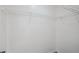 This empty walk-in closet features wire shelving and modern flooring at 3690 Sw 175Th St, Ocala, FL 34473