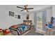 Star Wars themed bedroom with lots of natural light and neutral colors at 513 Kimbrel Ct, Haines City, FL 33844