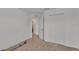 Minimalist bedroom with carpeted floors and a double door closet at 513 Kimbrel Ct, Haines City, FL 33844