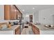 Modern kitchen featuring granite countertops, stainless steel appliances, and ample cabinet space at 513 Kimbrel Ct, Haines City, FL 33844
