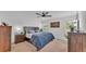 Comfortable main bedroom with large windows and nice natural light at 513 Kimbrel Ct, Haines City, FL 33844