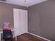 Bedroom with a large closet and vinyl plank flooring at 5225 Imperial Lakes Blvd # 52, Mulberry, FL 33860