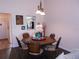 Inviting dining area with a round table and decorative accents, seamlessly connected to the living spaces at 5225 Imperial Lakes Blvd # 52, Mulberry, FL 33860