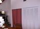 Dining room featuring wood table and chairs, closet with paneled doors, and partially visible adjacent rooms at 5225 Imperial Lakes Blvd # 52, Mulberry, FL 33860