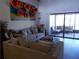 Comfortable living area with stylish seating and bright, open access to the outdoor patio space at 5225 Imperial Lakes Blvd # 52, Mulberry, FL 33860