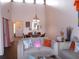 Open-concept living space with stylish decor, seamlessly connecting the living and dining areas at 5225 Imperial Lakes Blvd # 52, Mulberry, FL 33860