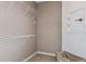 Walk-in closet with shelving and lots of space for storage at 5844 Sw 87Th Ave, Ocala, FL 34481
