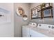 Laundry room featuring a washer, dryer, shelving, and decorative wall art at 5844 Sw 87Th Ave, Ocala, FL 34481