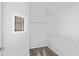 Spacious walk-in closet with carpet floor and white wire shelving for optimal storage and organization at 5844 Sw 87Th Ave, Ocala, FL 34481
