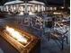 Outdoor fire pit area with seating for entertaining at 8199 Sw 52Nd Lane Rd, Ocala, FL 34481