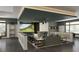 A recreation room offers a golf simulator, bar, and lounge area for residents to relax and have fun at 8283 Sw 54Th Loop, Ocala, FL 34481