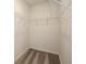 Spacious walk-in closet with ample shelving and storage solutions, perfect for organization at 8283 Sw 54Th Loop, Ocala, FL 34481