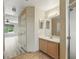 Open view from Primary bathroom to bedroom, shower, and vanity with sink at 2523 Jasmine Trace Dr, Kissimmee, FL 34758