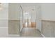 Inviting home hallway with tile flooring and neutral wall paint at 50989 Highway 27 # 179, Davenport, FL 33897