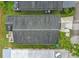 Aerial view of a home's roof, showcasing its condition and surrounding landscape at 50989 Highway 27 # 179, Davenport, FL 33897
