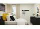 Well-lit bedroom with modern accents, a study area, and a peaceful, comfortable ambiance at 1313 Hammock Reserve Dr, Deland, FL 32720