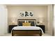 Inviting bedroom with stylish decor, bedside tables, and a warm, neutral color scheme at 1313 Hammock Reserve Dr, Deland, FL 32720