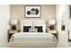 Bright bedroom featuring a comfortable bed with stylish bedside tables and modern decor at 1313 Hammock Reserve Dr, Deland, FL 32720